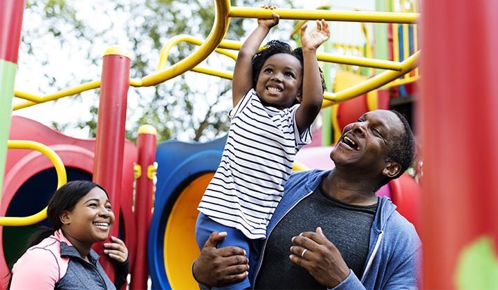 Family playing at a playground